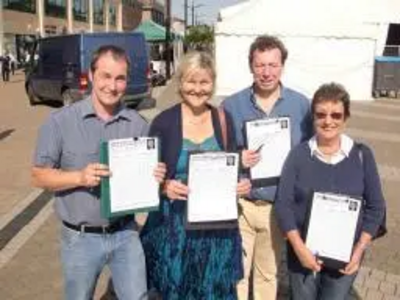 Terrye Teverson collecting signatures on Lemon Quay with Chris Pascoe, Rob Nolan and Ros Cox