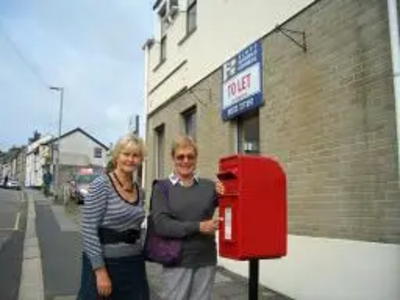 Terrye Teverson outside the old Kenwyn Post Office with local campaigner Anne Pengelly