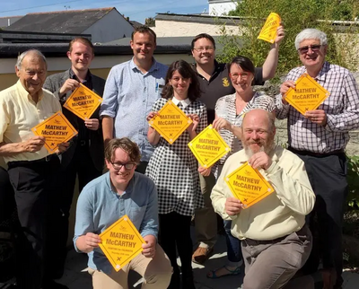 Mathew with election volunteers on polling day